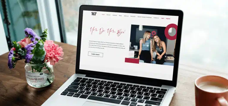 103yoga portfolio web design mockup on a laptop 2