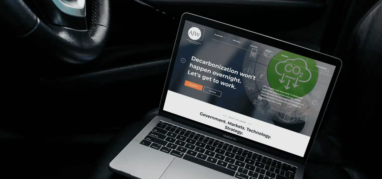 AJW web design mockup on a macbook pro