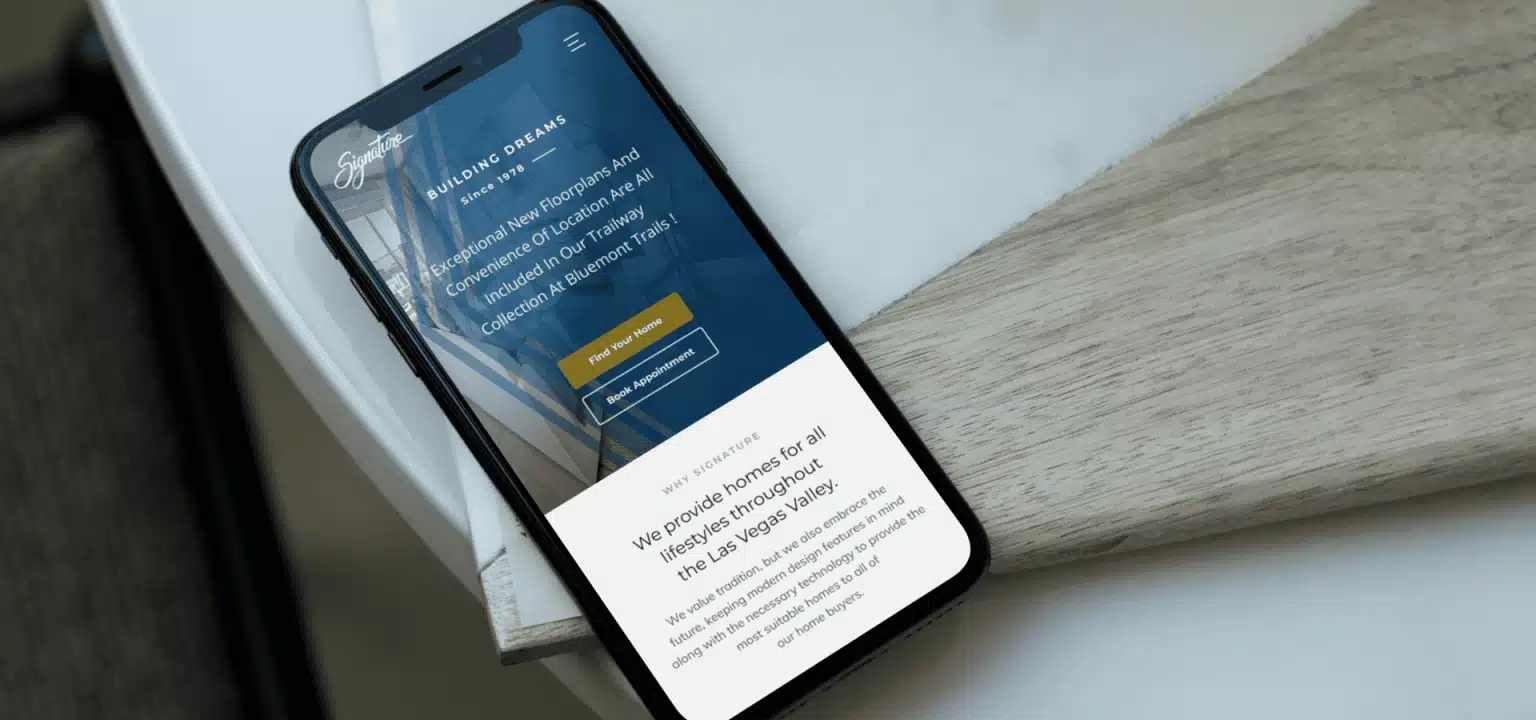 Signature Homes web design mock up on a phone